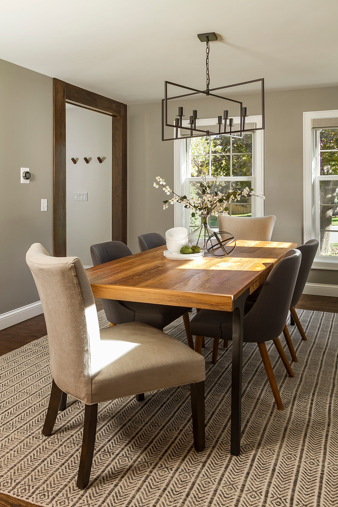 Photo of a transitional separate dining room in Minneapolis with grey walls.