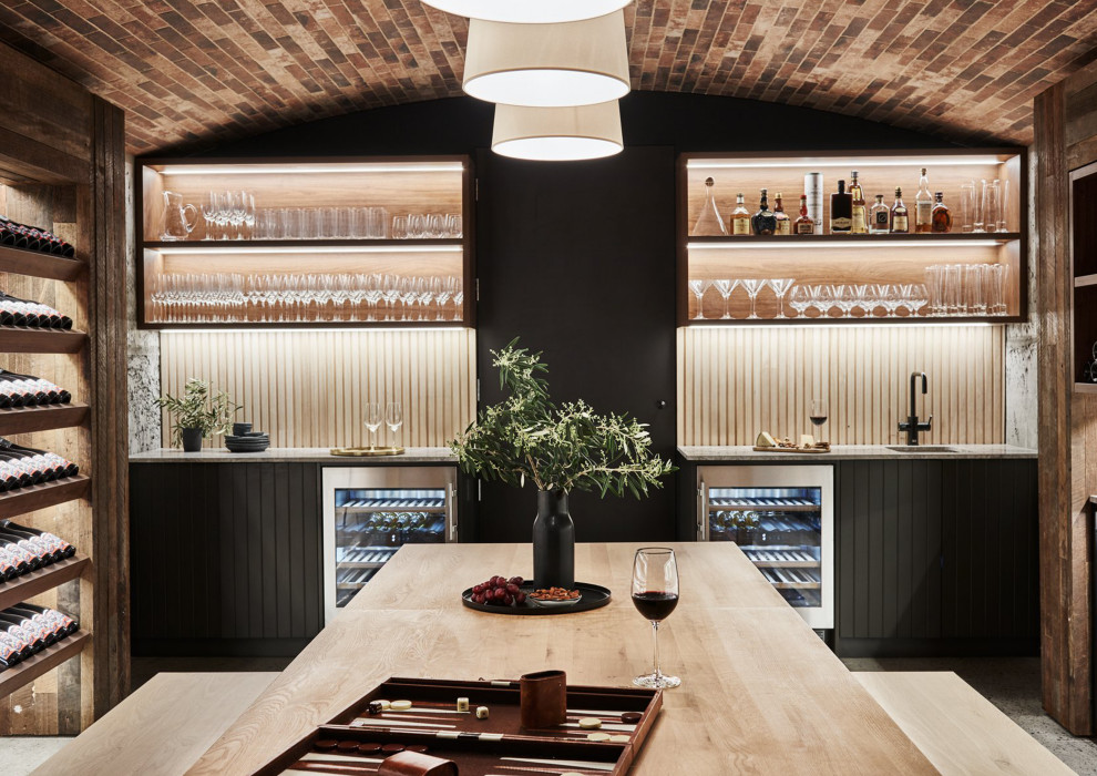 Photo of a contemporary wet bar in Melbourne with open cabinets, beige splashback and grey benchtop.