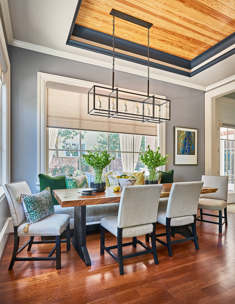 Inspiration for a transitional dining room in Other with dark hardwood floors and brown floor.