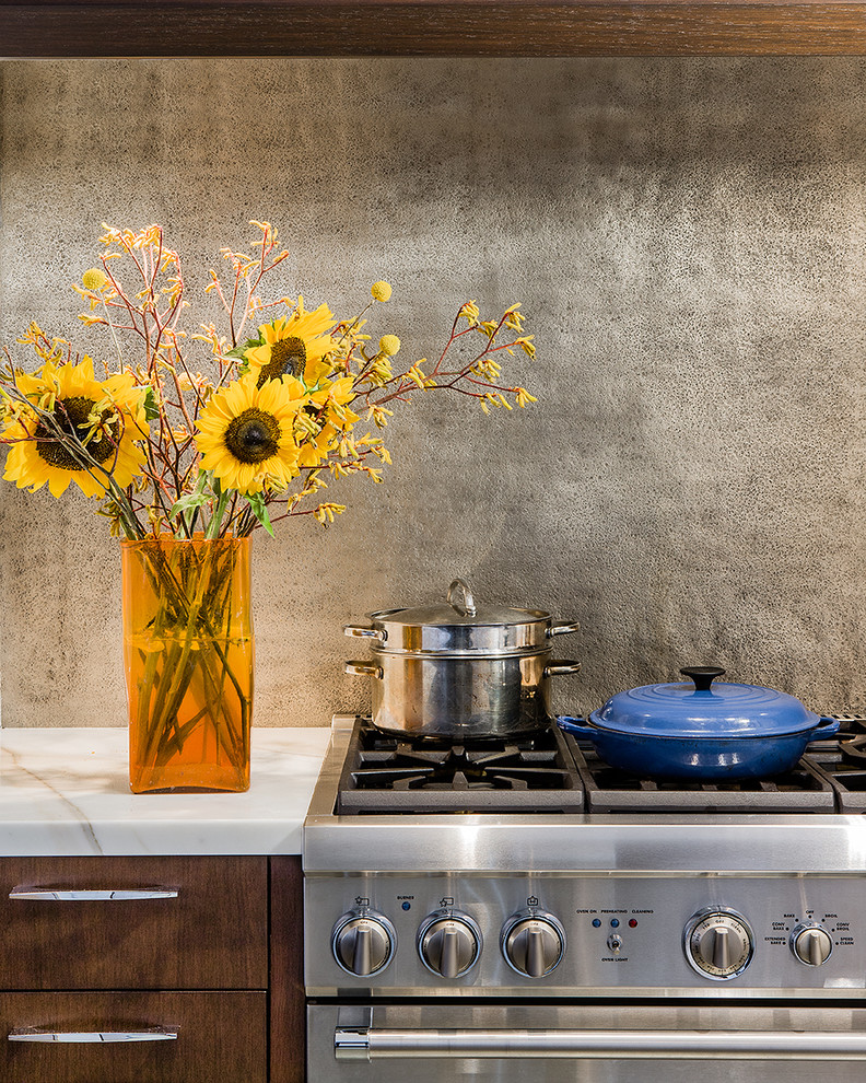 Inspiration for a country kitchen in Boston with grey splashback and stone slab splashback.