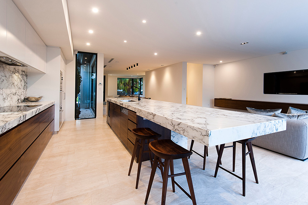 Photo of a modern kitchen in Perth with travertine floors.