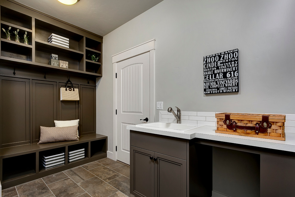 Photo of an arts and crafts laundry room in Boise.