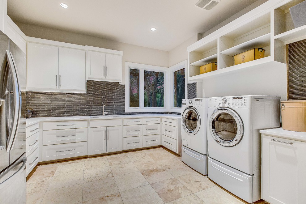 Photo of a contemporary laundry room in Austin.