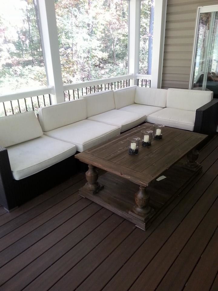 Inspiration for a transitional backyard balcony deck remodel in Baltimore with a roof extension