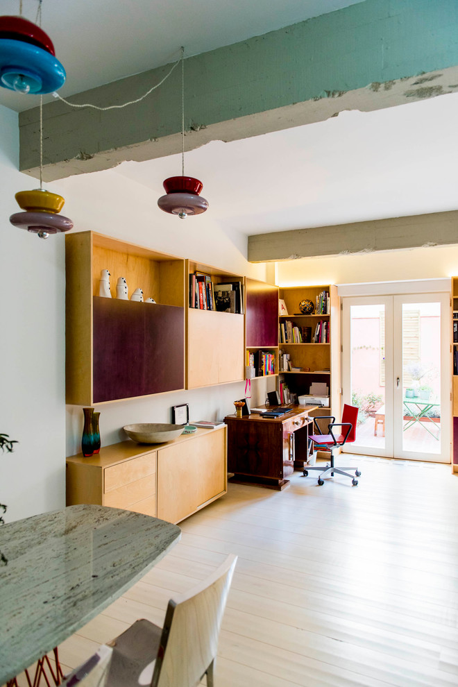 This is an example of an eclectic home office in Madrid.
