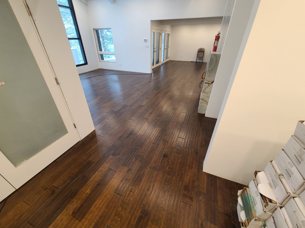 Sleek Engineered Hardwood & Modern Sliding Door by I’m The Man Services