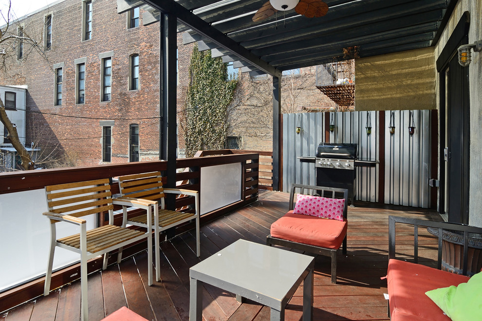 Deck - eclectic deck idea in New York with a pergola and a bbq area