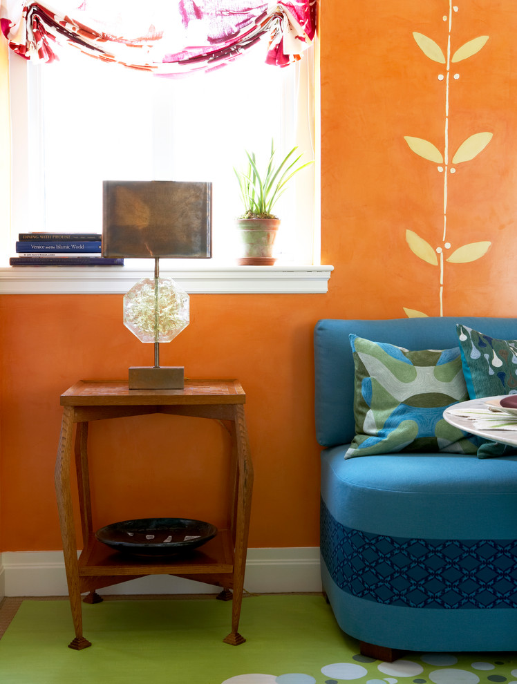 This is an example of a mid-sized eclectic living room in New York with orange walls, linoleum floors and no fireplace.