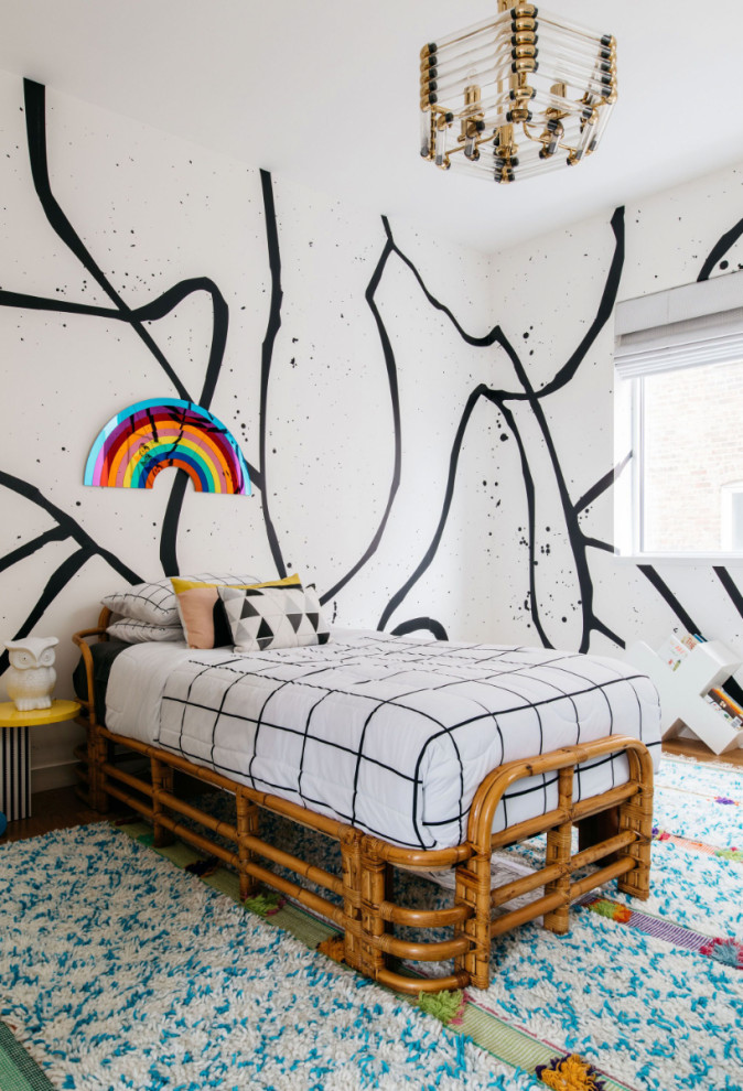 Design ideas for a contemporary gender-neutral kids' bedroom for kids 4-10 years old in Chicago with multi-coloured walls, medium hardwood floors and brown floor.