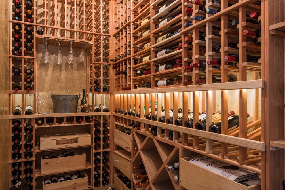 Small traditional wine cellar in Phoenix with storage racks.