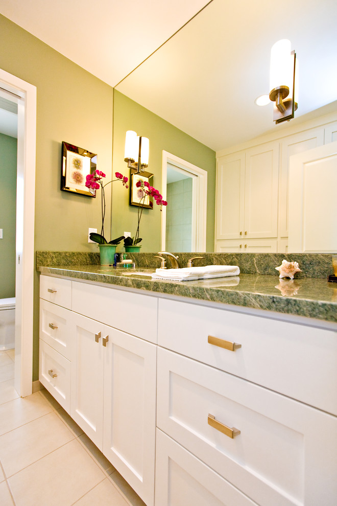 Large contemporary bathroom in San Francisco with an undermount sink, shaker cabinets, white cabinets, granite benchtops, a drop-in tub, a shower/bathtub combo, a one-piece toilet, beige tile, porcelain tile, green walls and porcelain floors.