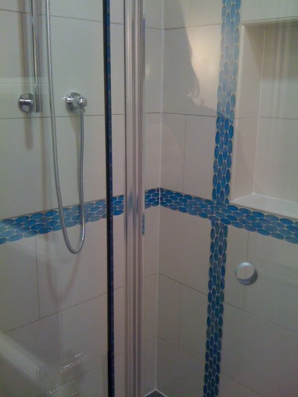Gap in frameless shower door this is wrong, right?