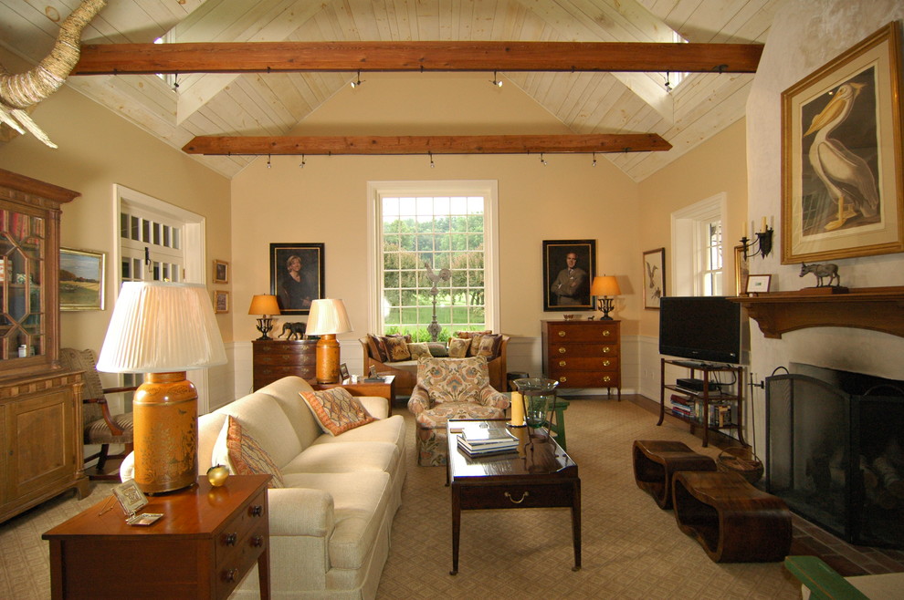 Large transitional open concept family room in Philadelphia with medium hardwood floors, a standard fireplace and a plaster fireplace surround.