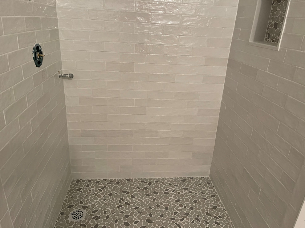 How to fix tile that is slanted with pitch of tile floor
