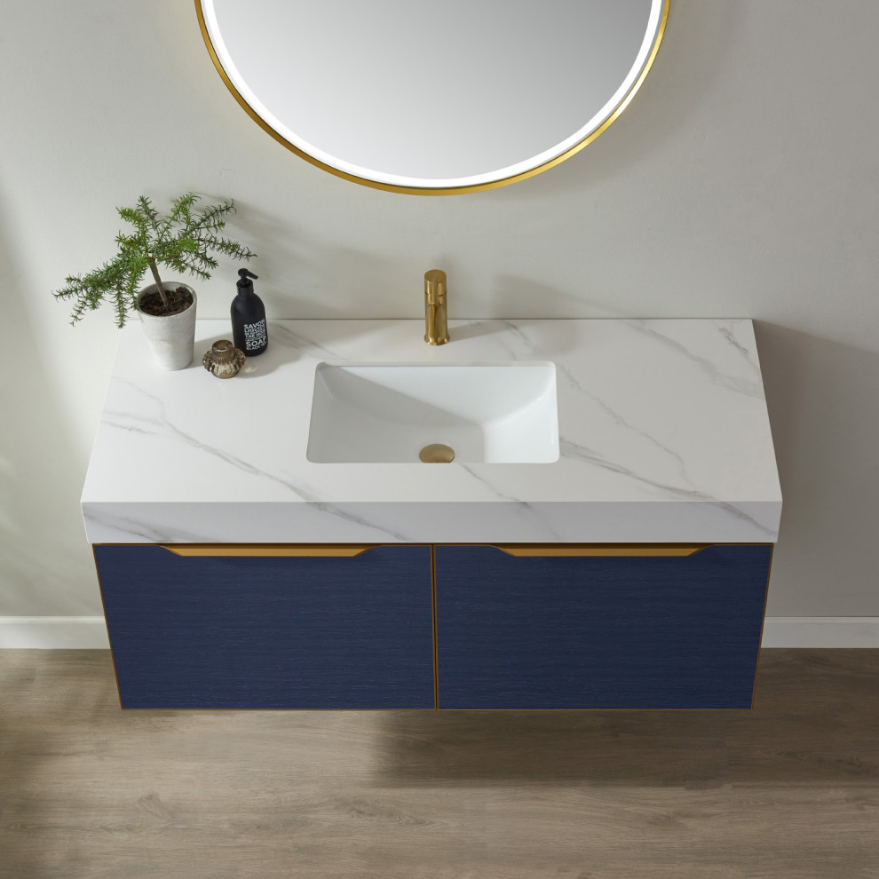 Medium sized modern ensuite bathroom in Wichita with flat-panel cabinets, blue cabinets, a submerged sink, engineered stone worktops, white worktops, a single sink and a floating vanity unit.