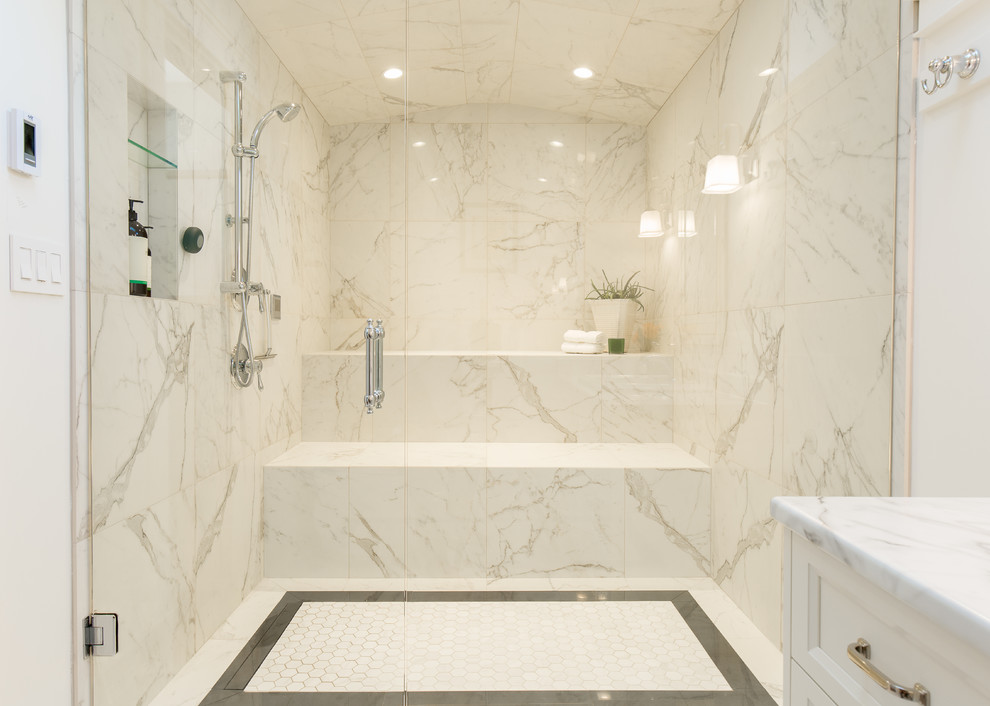 Design ideas for a large traditional bathroom in Vancouver with recessed-panel cabinets, white cabinets, an alcove shower, marble, white walls, marble floors, a drop-in sink, marble benchtops, a hinged shower door, white tile, white floor and white benchtops.