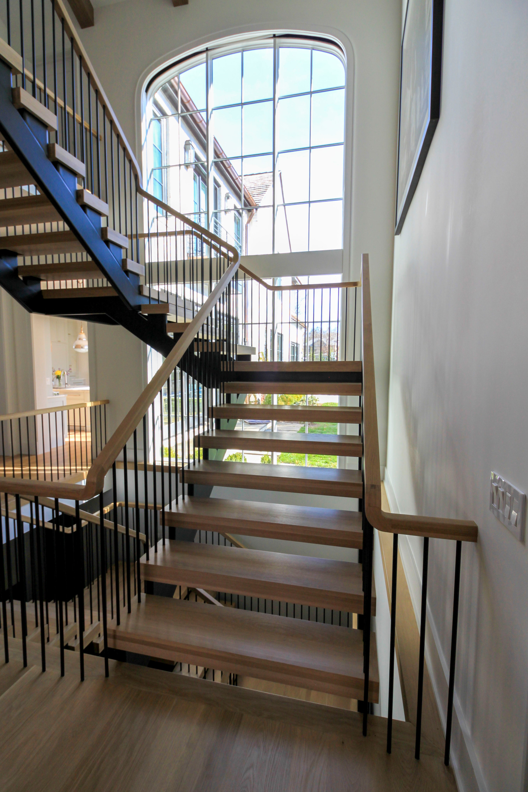 96_Dramatic cantilevered no-riser staircase, Bethesda, MD 20814