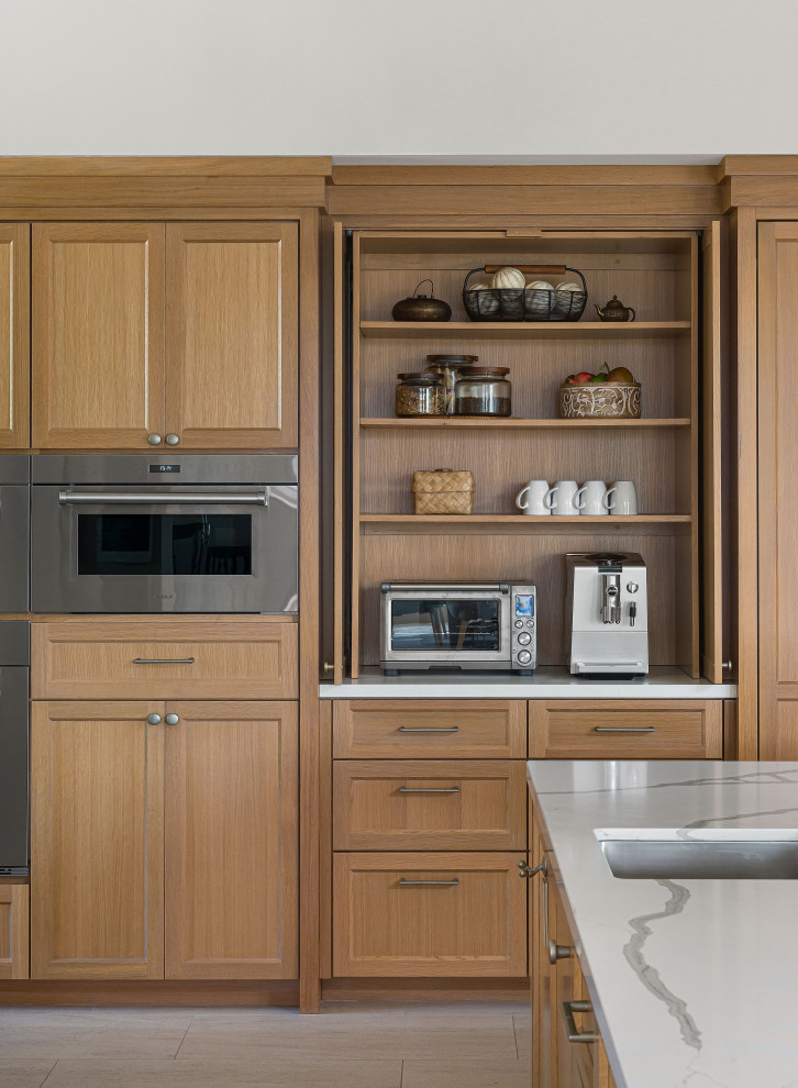 Inspiration for a large transitional porcelain tile kitchen remodel