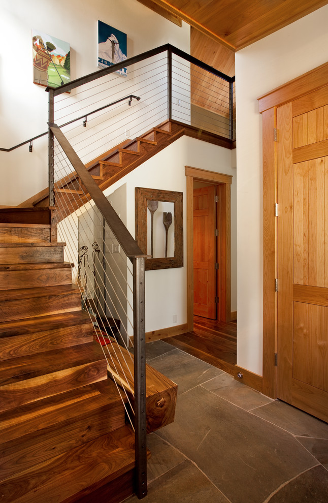 This is an example of a mid-sized contemporary wood l-shaped staircase in San Francisco with wood risers.