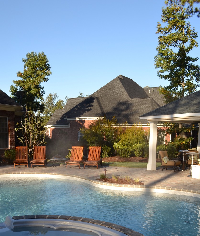 Inspiration for a modern pool remodel in Charlotte