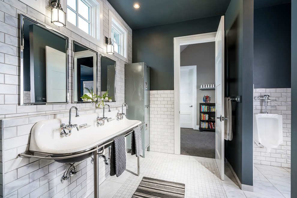 Photo of a mid-sized transitional kids bathroom in Other with grey cabinets, an alcove shower, subway tile and a trough sink.