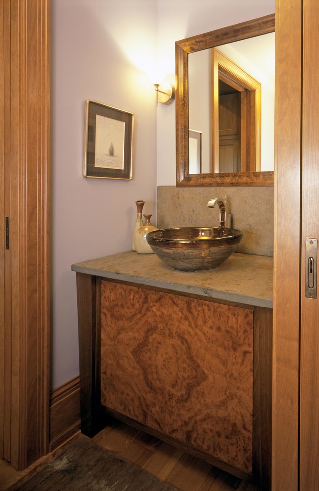 Small traditional 3/4 bathroom in Minneapolis with a vessel sink, furniture-like cabinets, medium wood cabinets, concrete benchtops, purple walls, medium hardwood floors, a drop-in tub, a curbless shower, a two-piece toilet, gray tile and stone slab.
