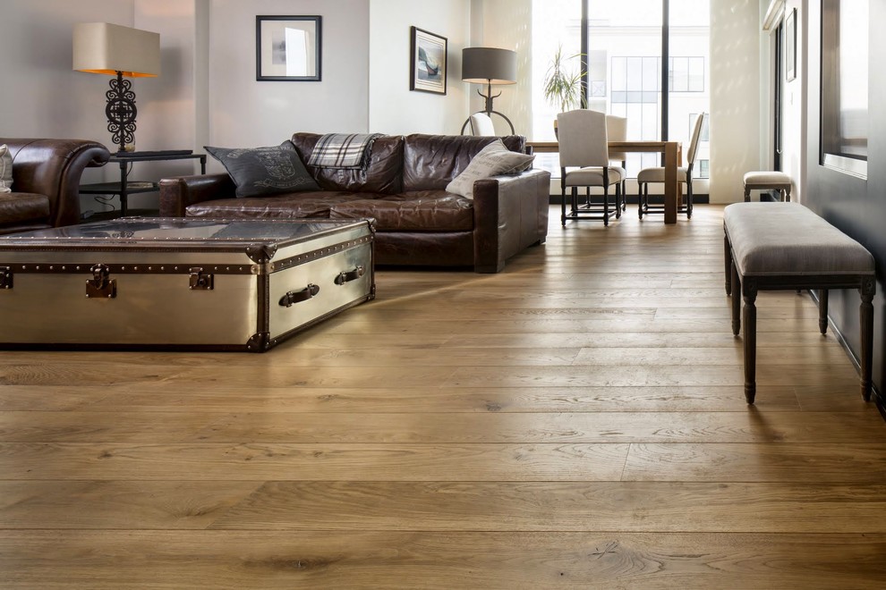 Example of a transitional light wood floor home design design in Calgary