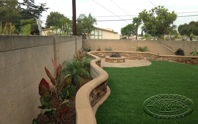 Fire Pit And Planter Wall Tropical Garden Orange County By