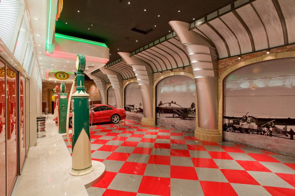Inspiration for an eclectic four-car garage remodel in Phoenix