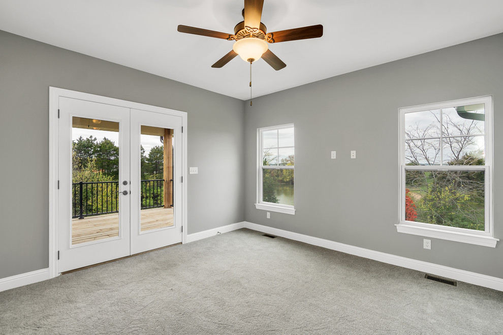 Design ideas for a transitional master bedroom in St Louis with grey walls, carpet, grey floor and no fireplace.