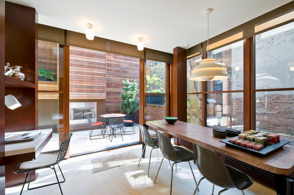 Design ideas for a mid-sized modern dining room in New York.