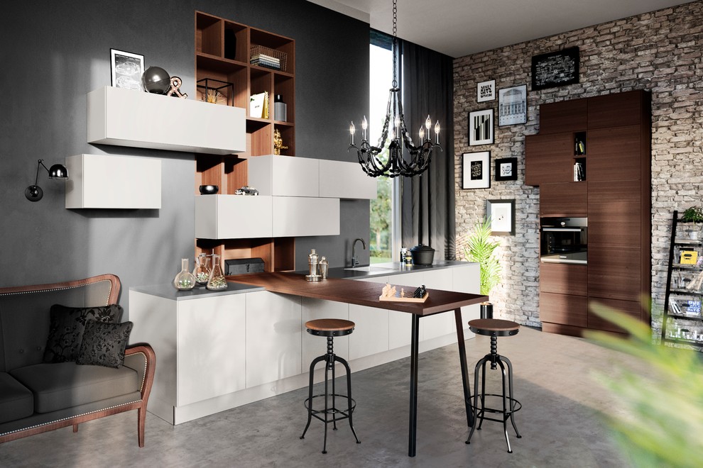Inspiration for a mid-sized industrial l-shaped eat-in kitchen in Hanover with flat-panel cabinets, grey cabinets, quartzite benchtops, brown splashback, timber splashback, black appliances, no island, grey floor and grey benchtop.