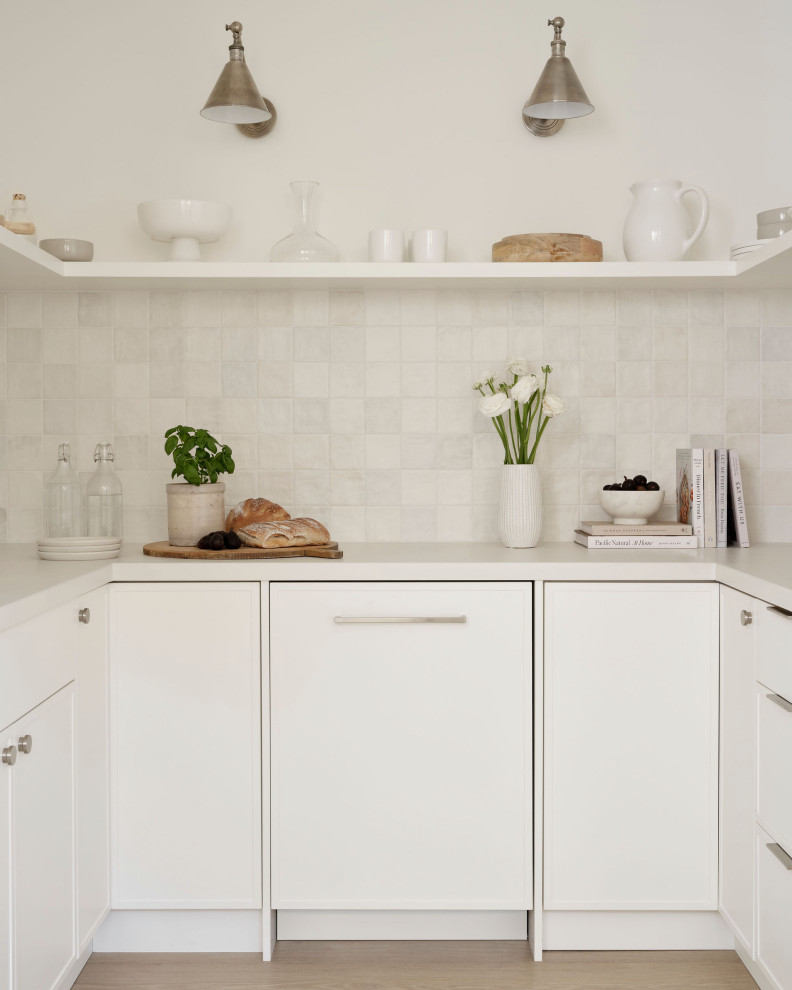 Example of a transitional kitchen design in Toronto