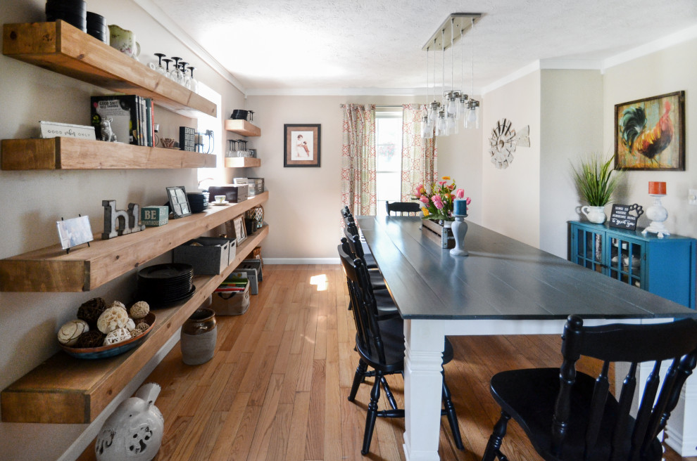 Inspiration for a mid-sized rustic light wood floor and beige floor enclosed dining room remodel with beige walls