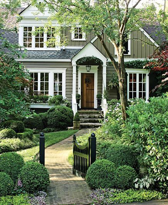 Design ideas for a traditional green exterior in Charlotte.
