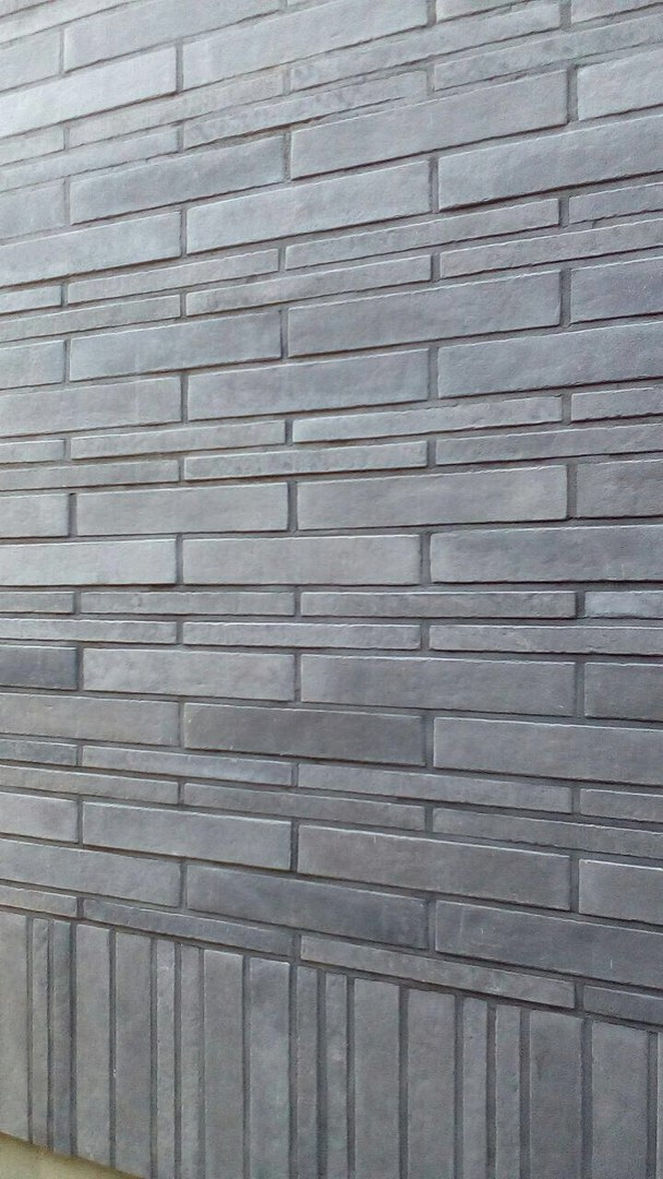 Облицовка дома декоративной ригельной плиткой