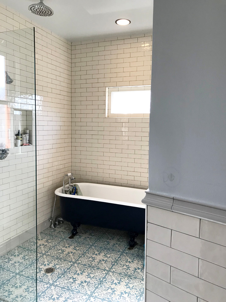 Design ideas for a mid-sized traditional master wet room bathroom in Seattle with shaker cabinets, white cabinets, a claw-foot tub, a two-piece toilet, white tile, ceramic tile, blue walls, cement tiles, a pedestal sink, multi-coloured floor and an open shower.