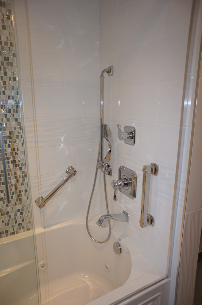 Inspiration for a small transitional white tile and ceramic tile ceramic tile drop-in bathtub remodel in New York with gray cabinets, a vessel sink and quartz countertops