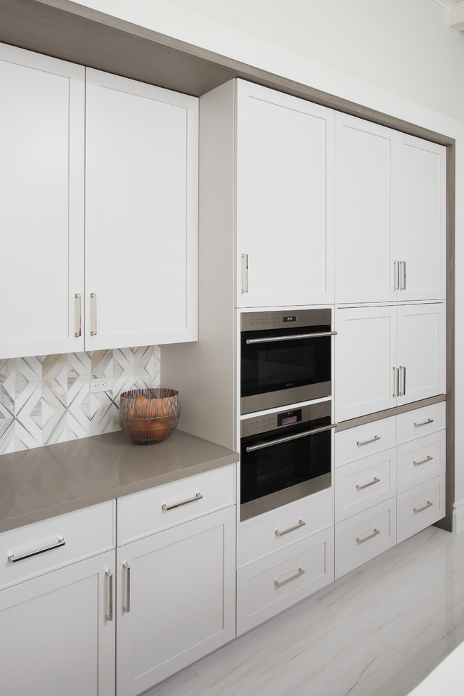 Example of a transitional kitchen design in Miami