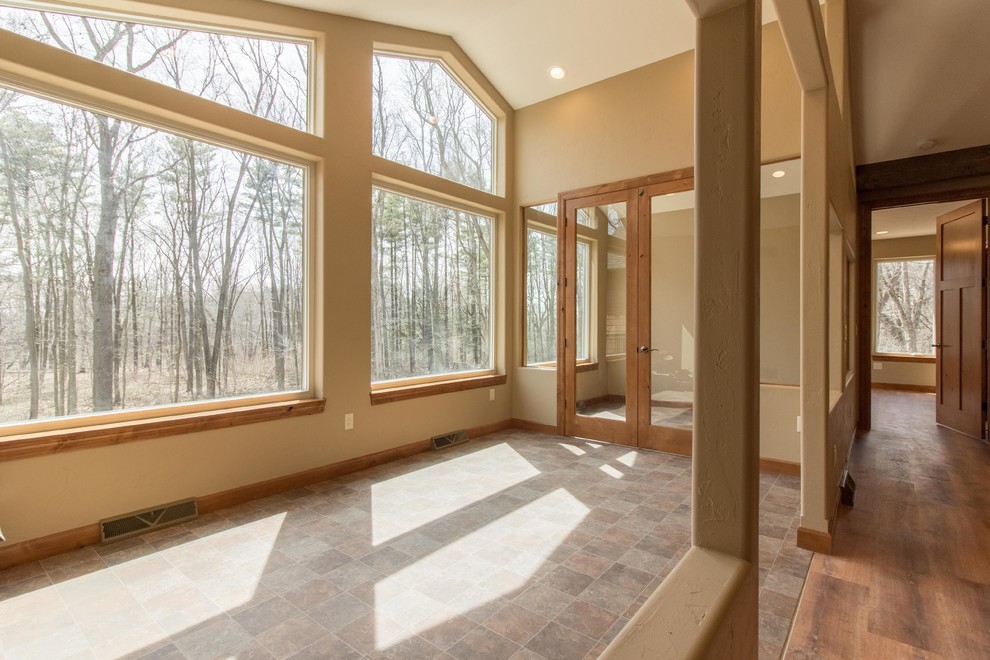 Mountain style sunroom photo in Milwaukee