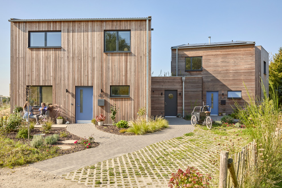 Holzfassade Haus With Holzfassade and beiger Fassadenfarbe in Hamburg