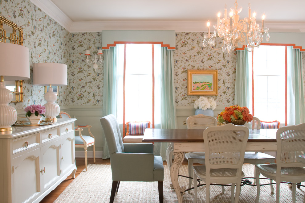 This is an example of a separate dining room in Philadelphia with multi-coloured walls and medium hardwood floors.