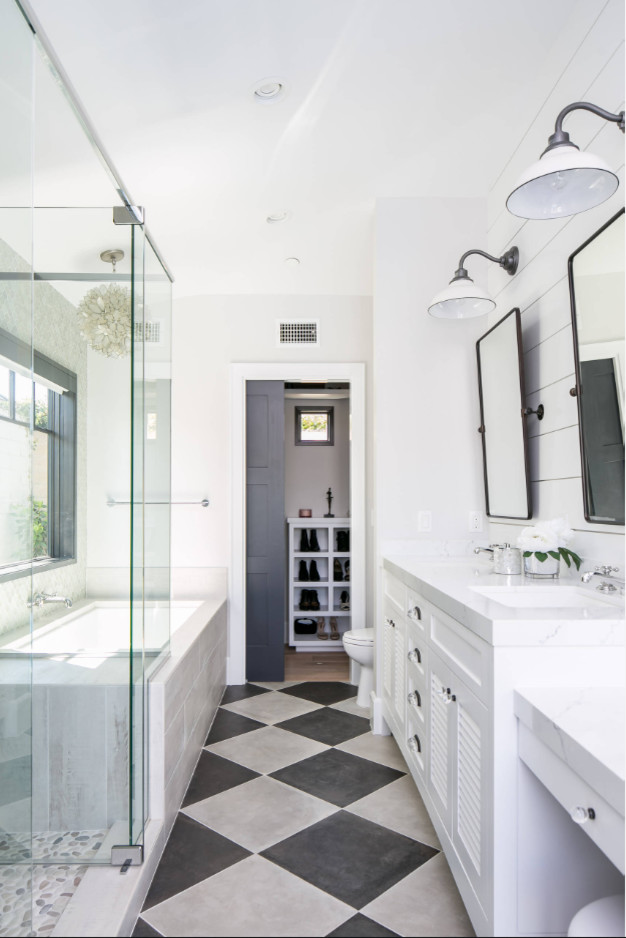 Inspiration for a mid-sized contemporary master bathroom in Orange County with white cabinets, an undermount tub, a corner shower, gray tile, slate, white walls, ceramic floors, multi-coloured floor, a hinged shower door, louvered cabinets, an undermount sink and white benchtops.