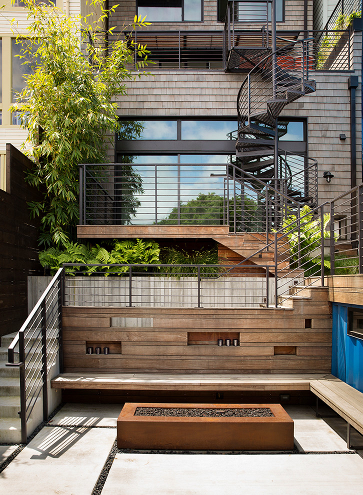 Contemporary patio in San Francisco with a fire feature and no cover.