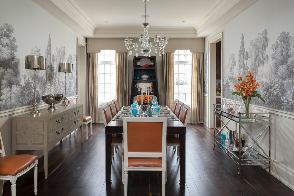 This is an example of a large traditional separate dining room in Toronto with dark hardwood floors and multi-coloured walls.