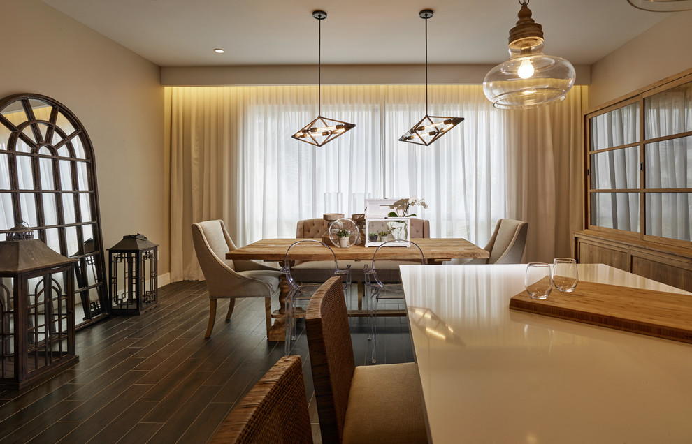 Example of a large transitional porcelain tile kitchen/dining room combo design in Miami with beige walls