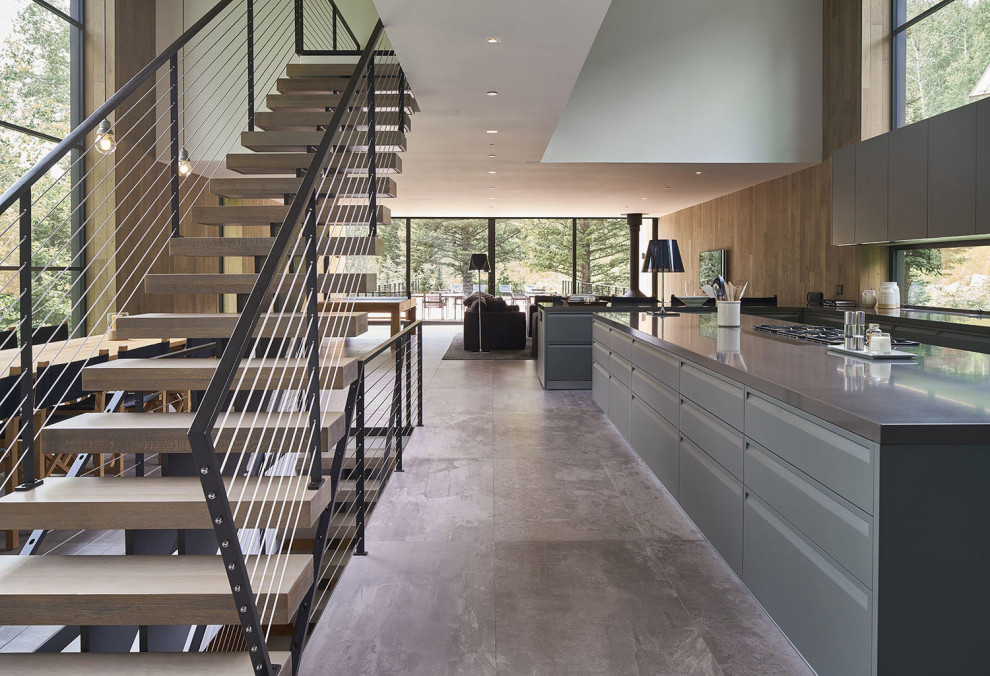 Example of a mountain style home design design in Denver