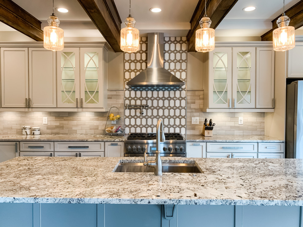 Kitchen - transitional dark wood floor and exposed beam kitchen idea with a single-bowl sink, flat-panel cabinets, gray cabinets, granite countertops, gray backsplash, porcelain backsplash, stainless steel appliances and an island