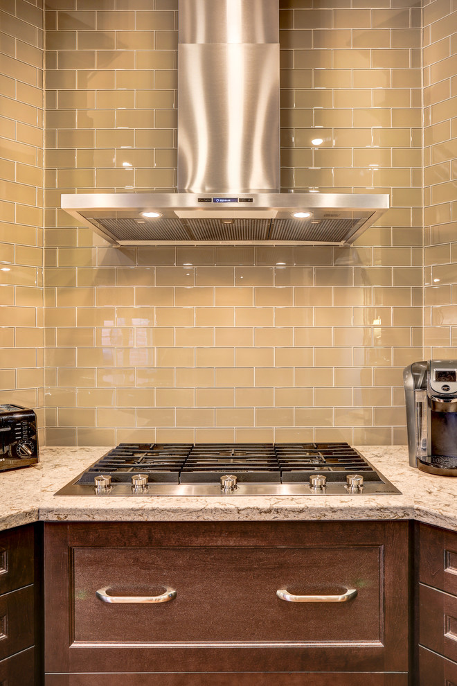 Example of a transitional kitchen design in Toronto