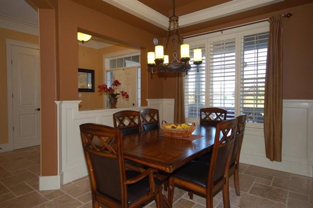 Dining with Wood Panel Accent